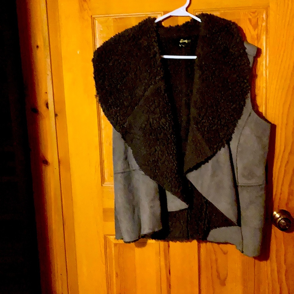 Gray fleece vest. Incredibly warm. Lined with fleece.